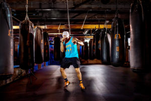 boxer trains for Haymakers of Hope at Everybody Fights gym photographed by Boston fitness photographer nicole loeb